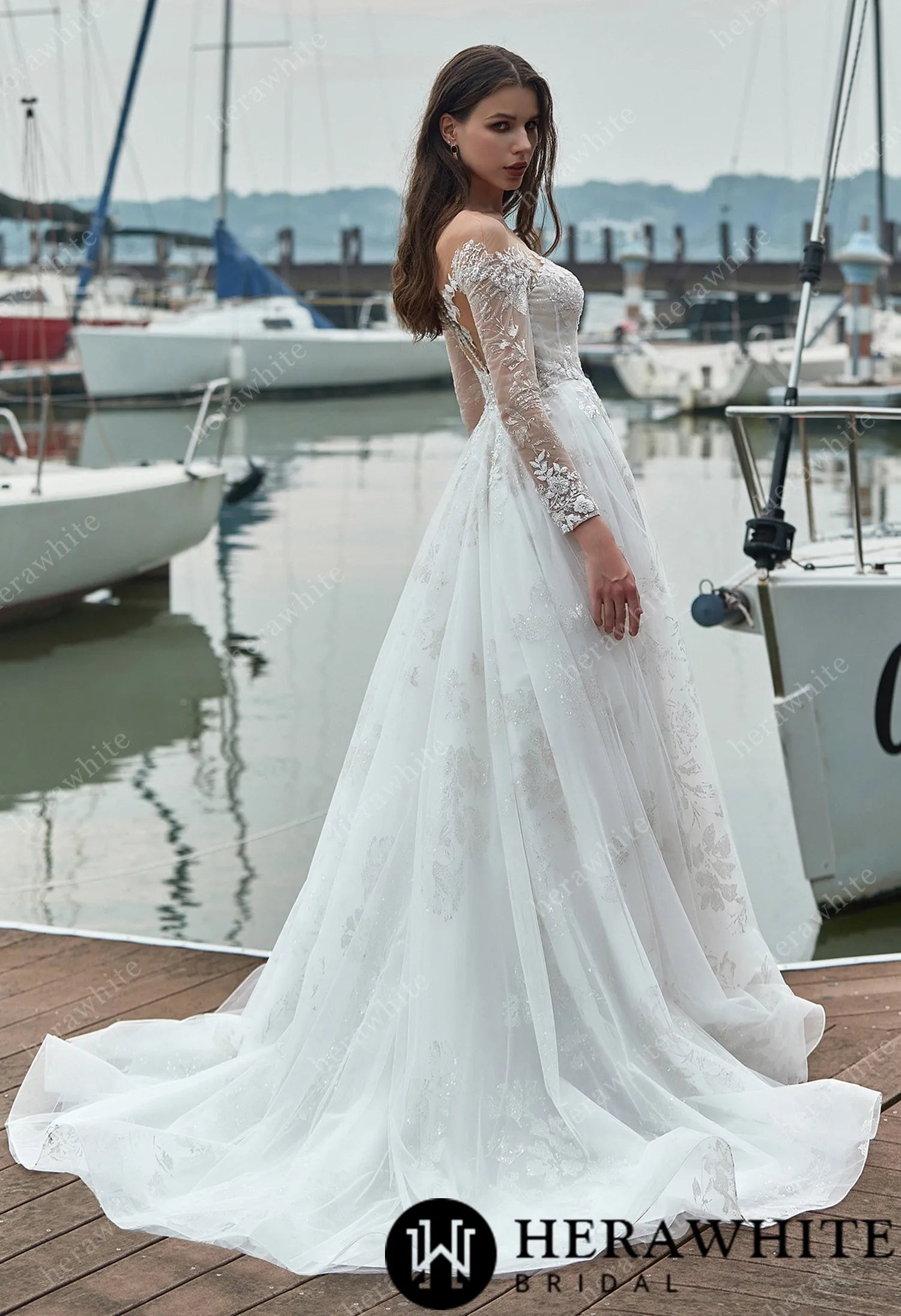 Elegant bridal gown with sweetheart neckline and illusion back