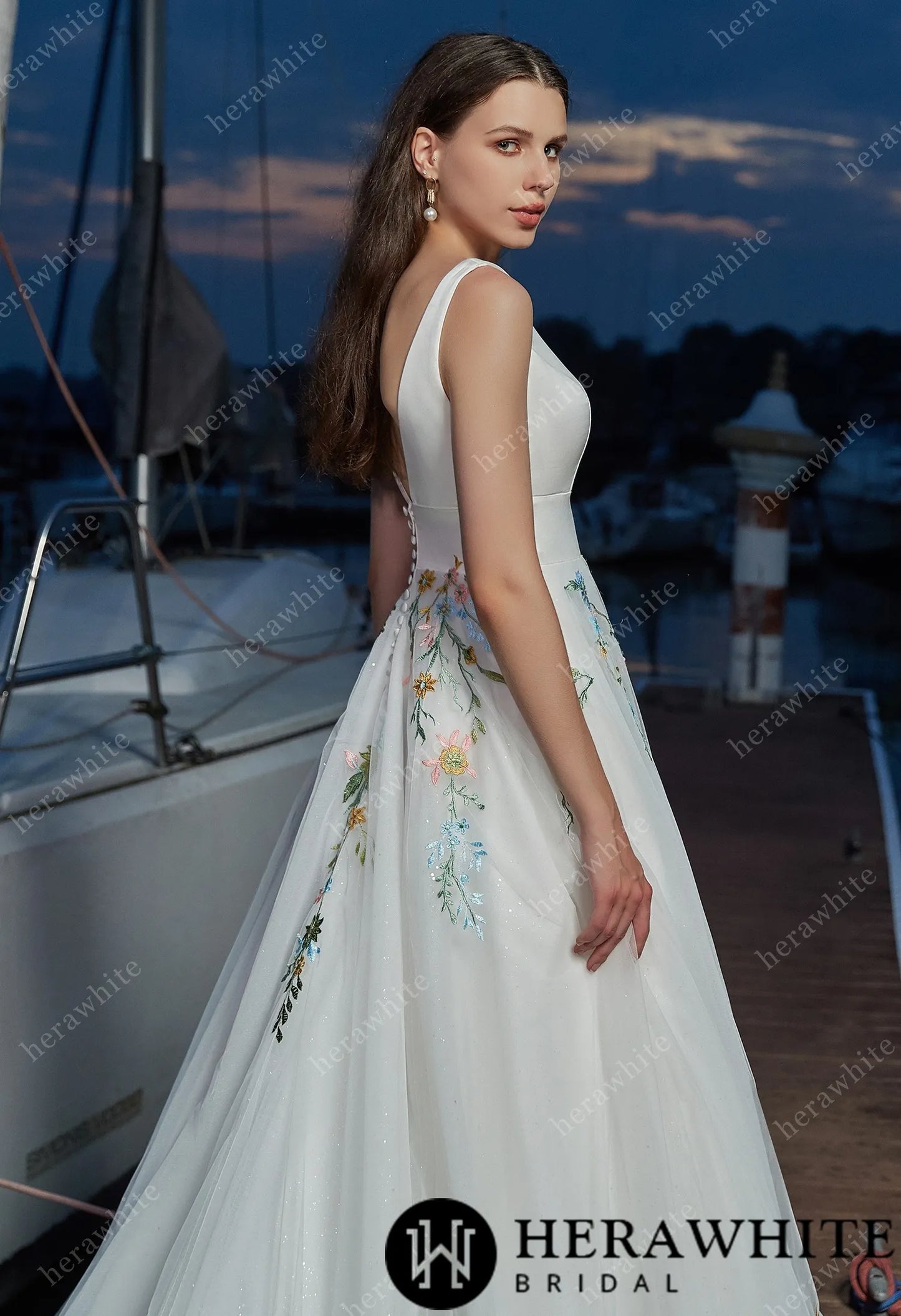 Boho bride dress with V-neck and multicolor lace details”