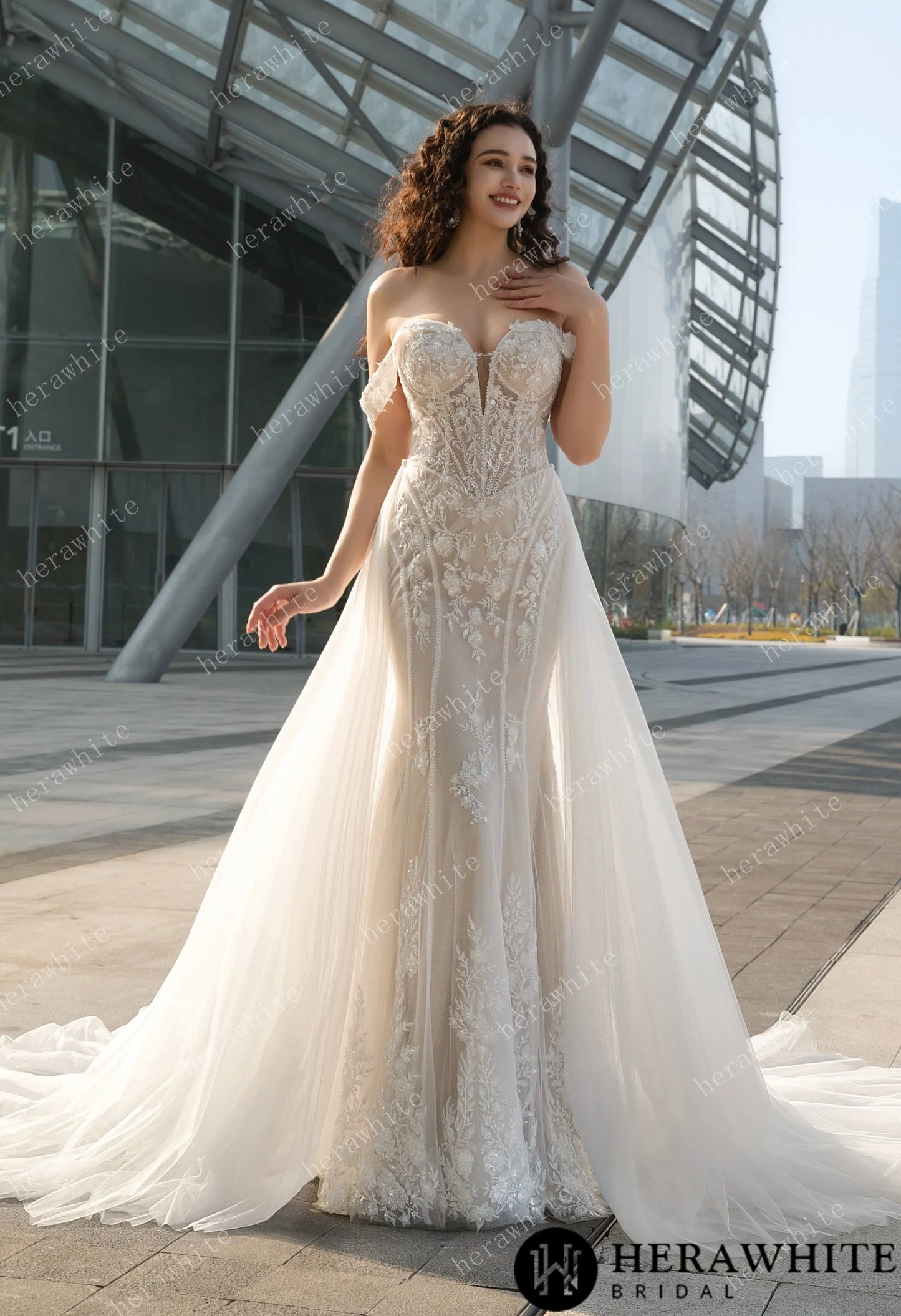 Bride wearing the Jasmine Fit-and-Flare Wedding Gown | Unforgettable Bridal