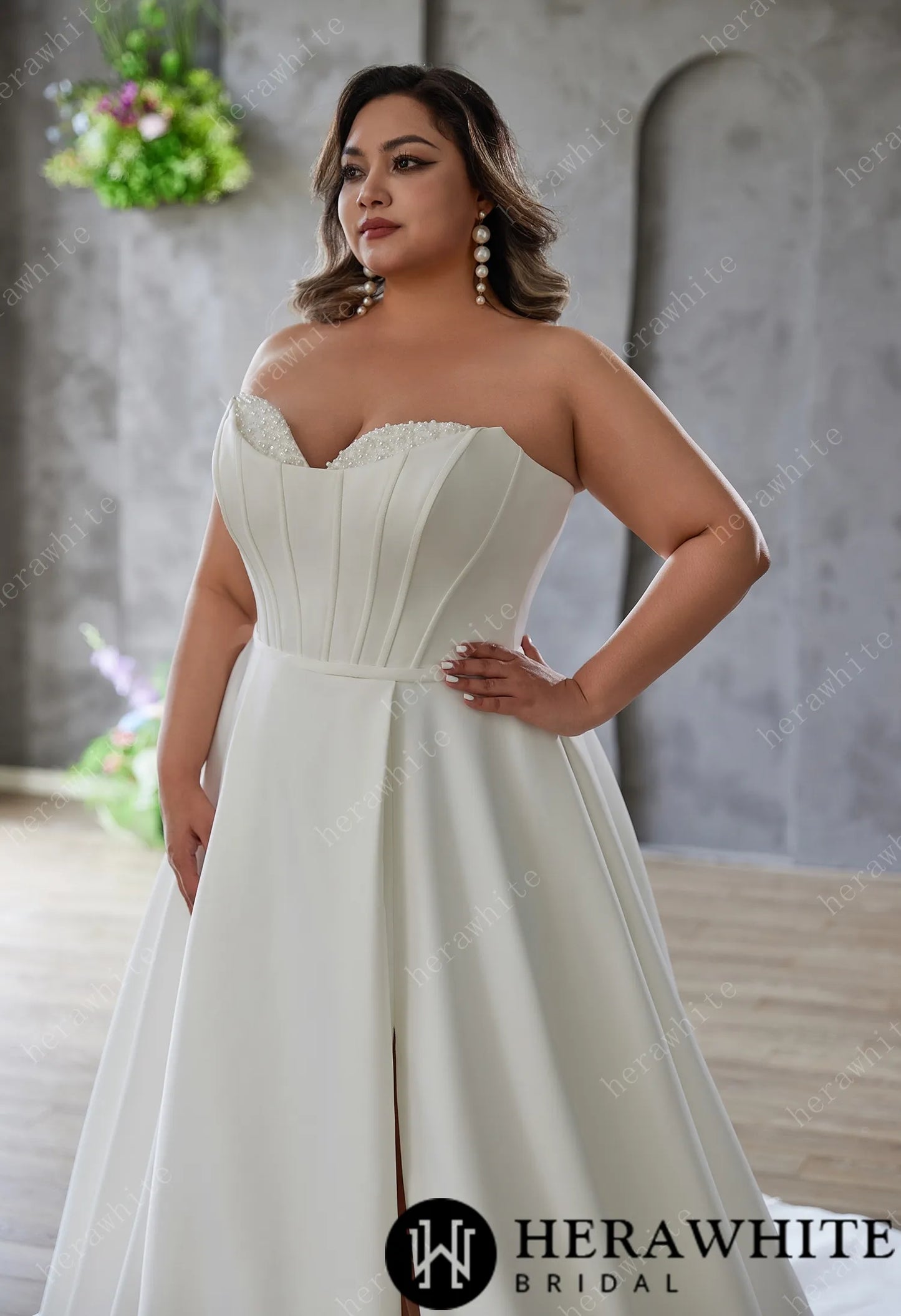 Closeup of Bride Mattie- Satin Sculpted Strapless A-Line Bridal Gown