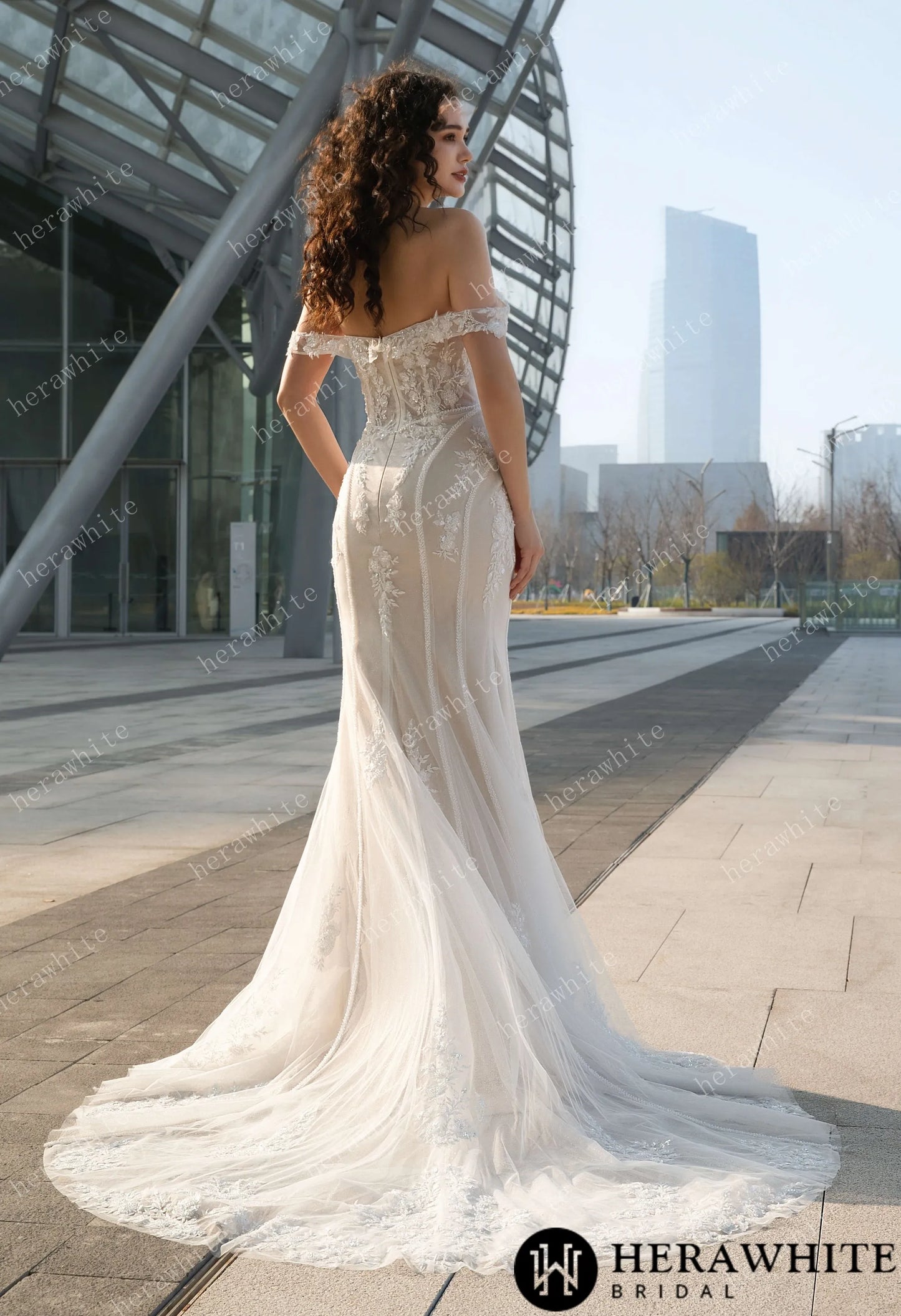 back view of bride wearing Jasmine Fit-and-Flare Wedding Gown