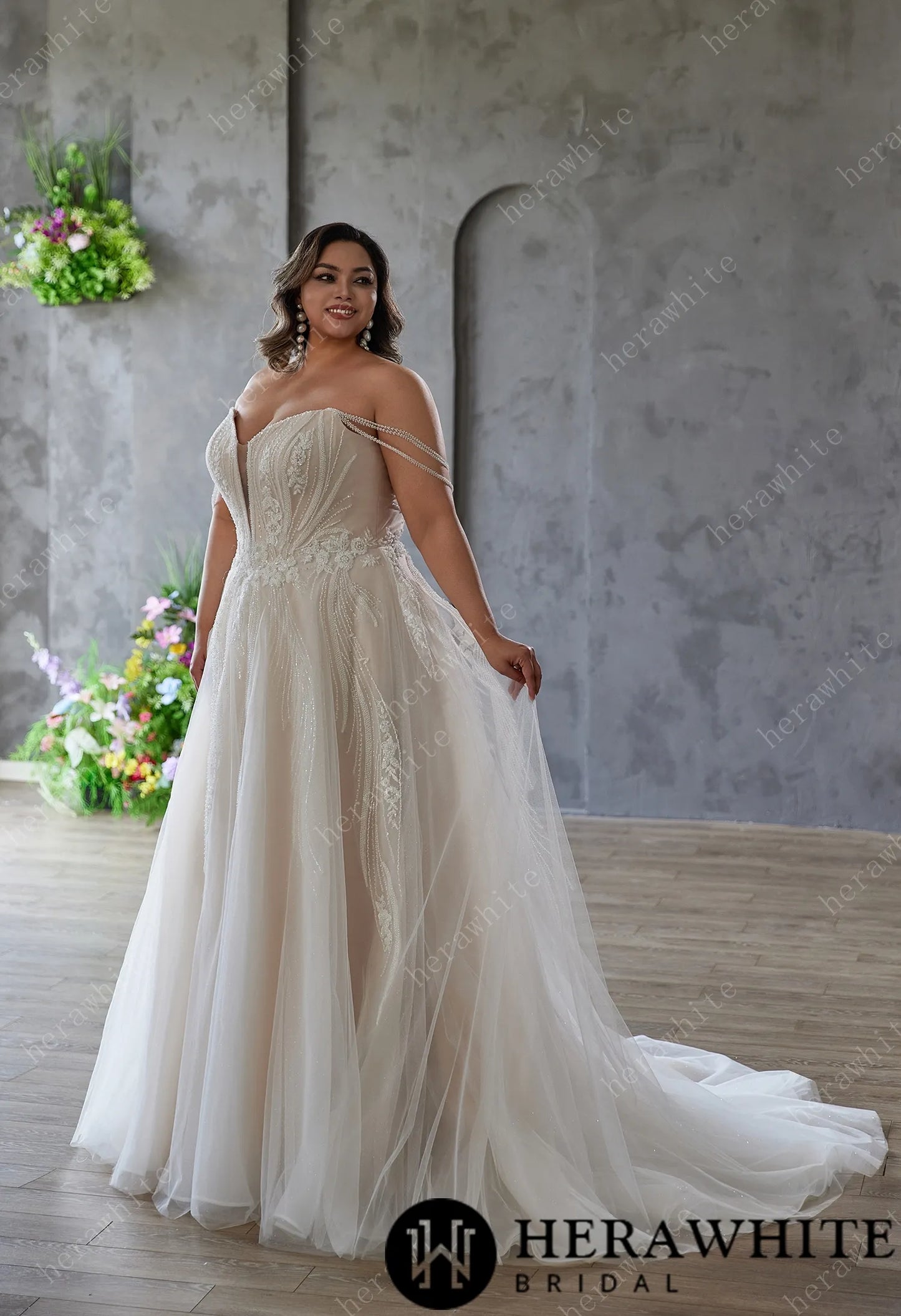 Bride wearing The Dream Wedding Gown – Strapless Sweetheart A-Line Bridal Dress