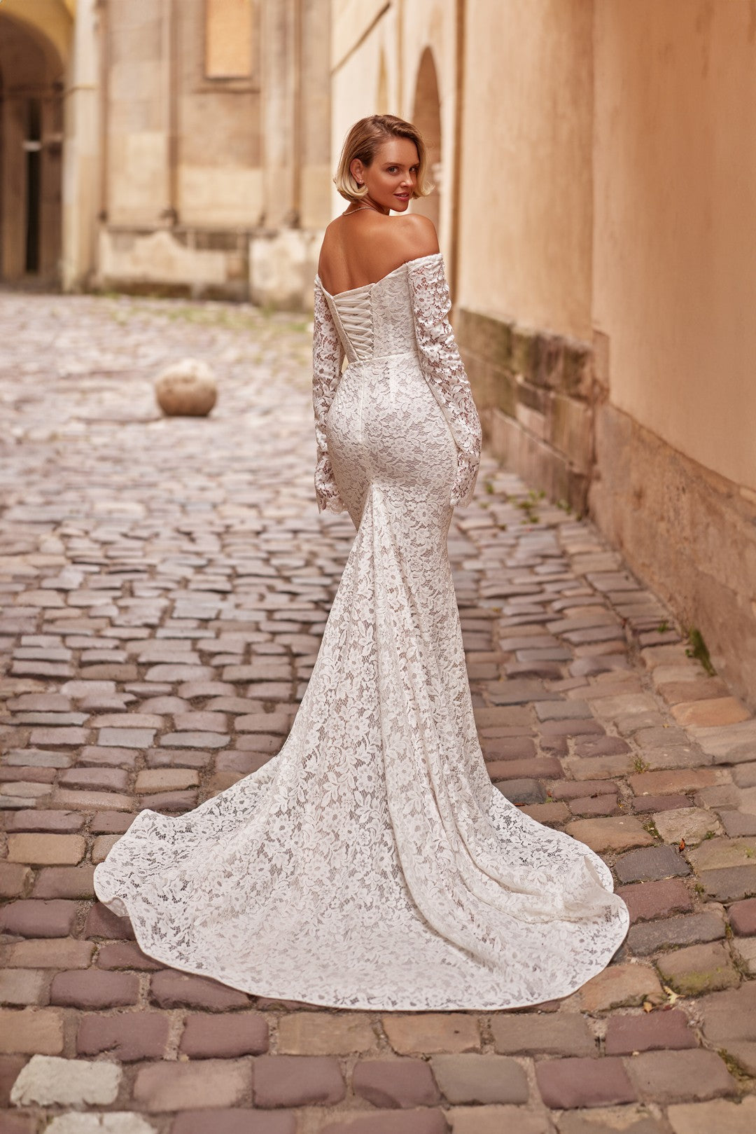 back overview of Bride wearing Gold Top Bridal Gown – Corset Lace Mermaid Wedding Dress with sweeping train