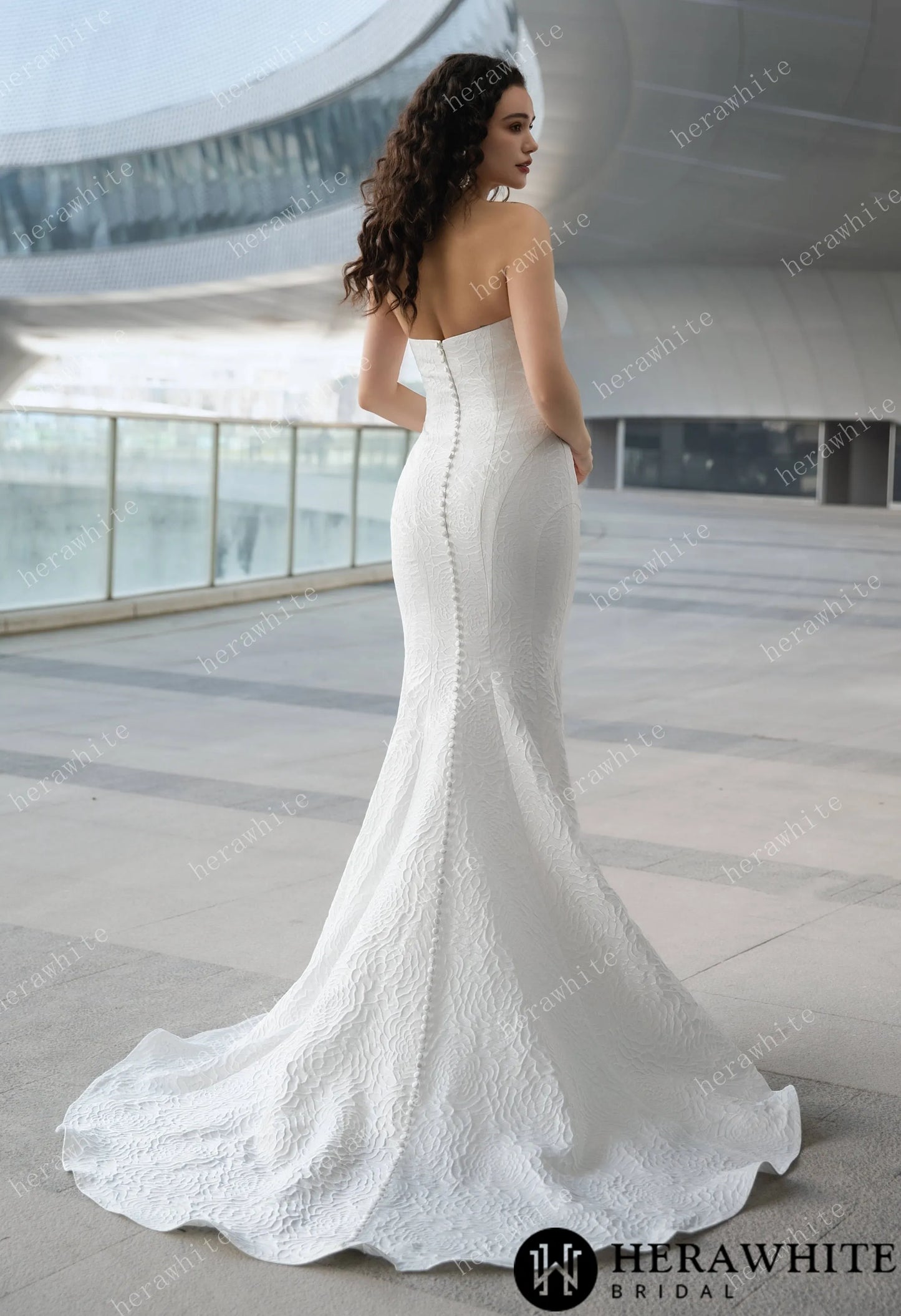 The Georgianna -Jacquard satin mermaid wedding gown with buttons down the back.