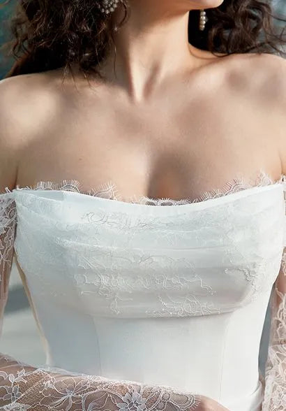 Close - up of the off - the - shoulder neckline with intricate lace detailing, highlighting the delicate lace patterns on the bodice.