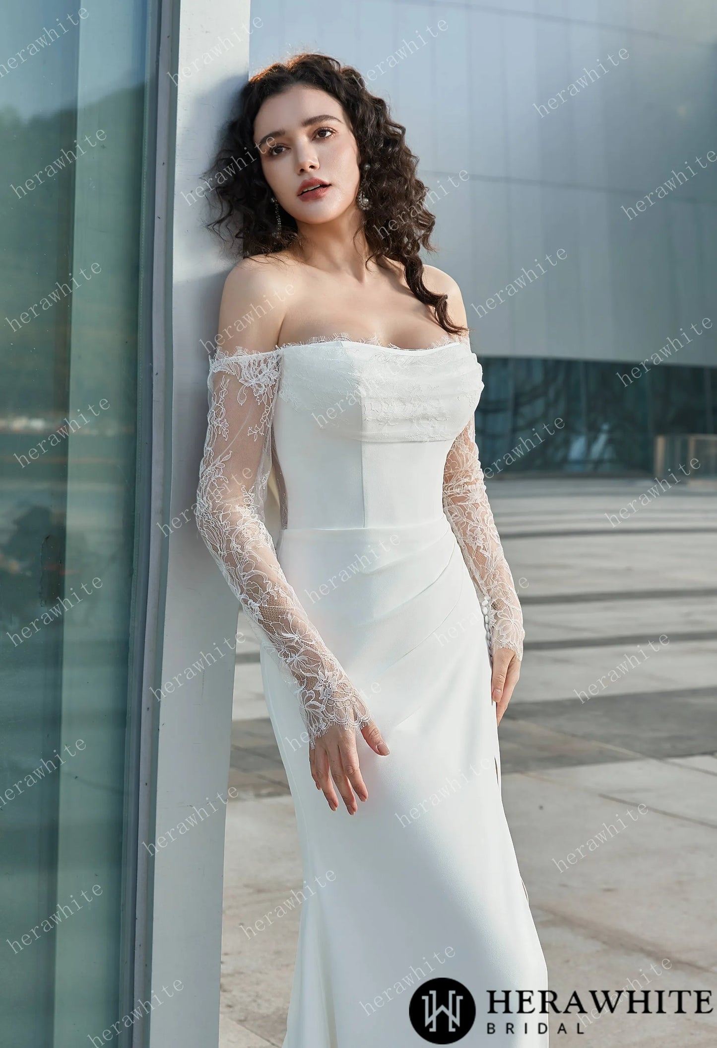 Bride wearing the "Megan" Modern Glam-Off-the-Shoulder Bridal Gown with Thigh-High Slit & Delicate Lace Sleeves