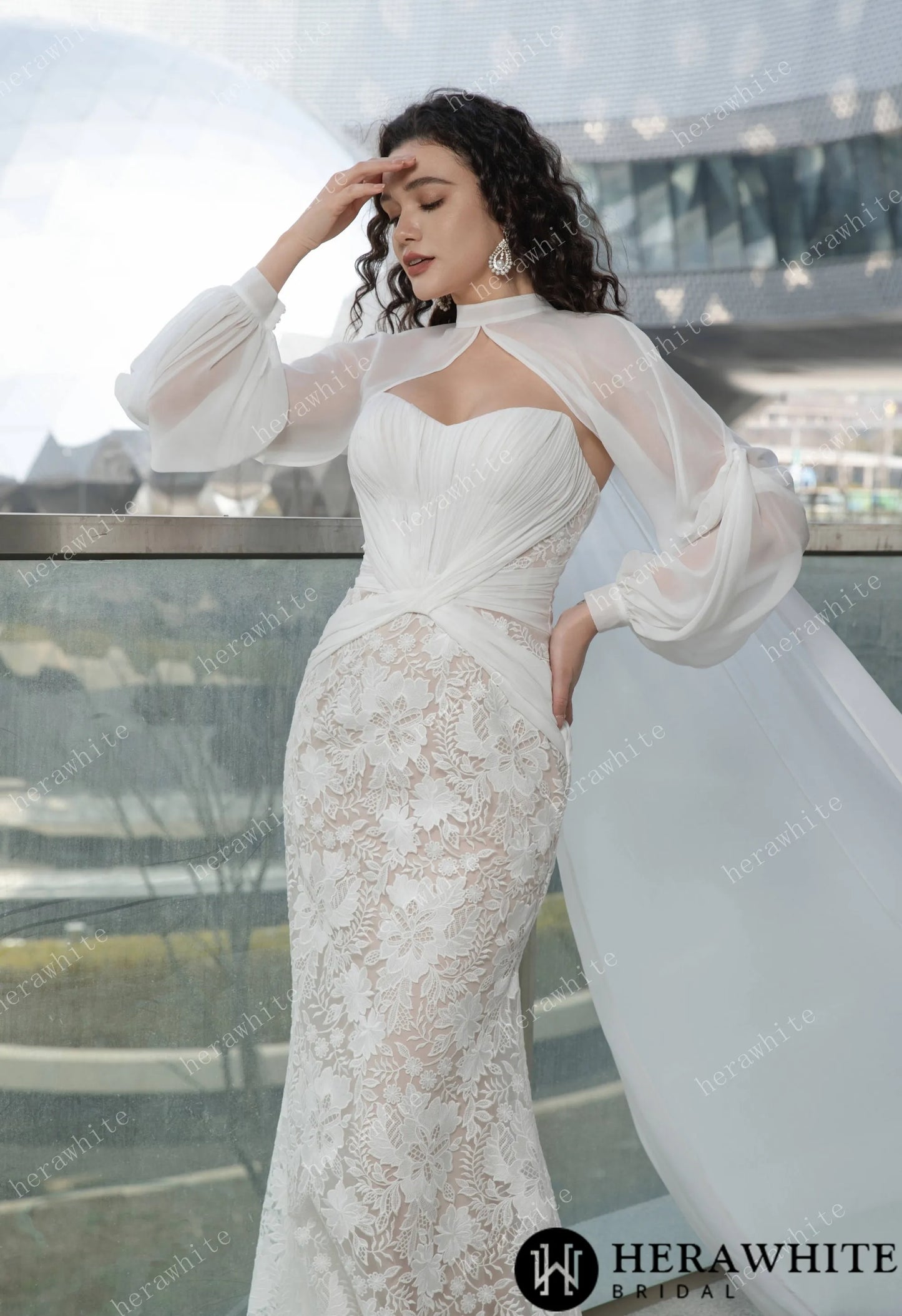 Bride wearing the Ruth- Pleated Mermaid Wedding Dress with Sheer Cape
