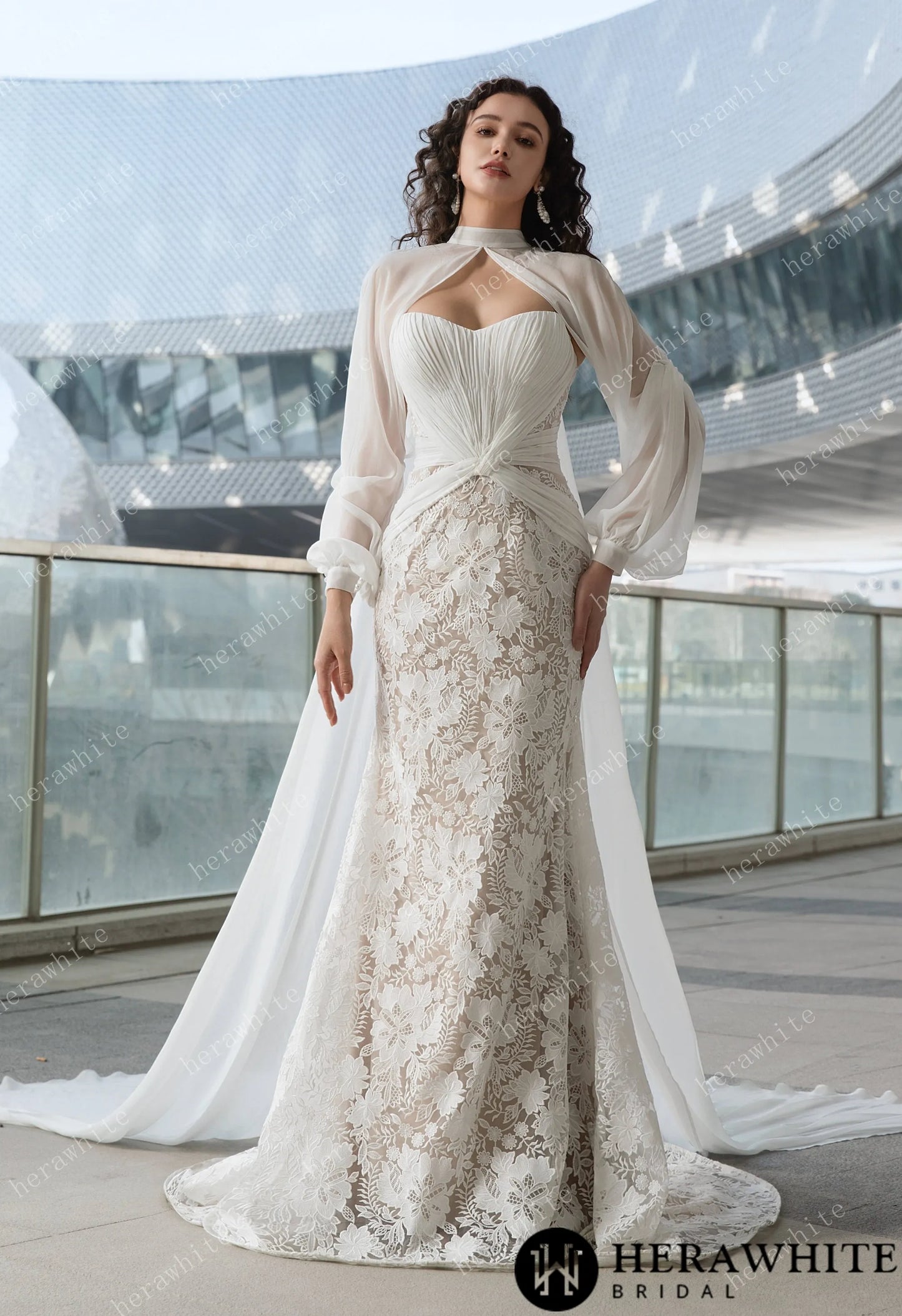 Bride wearing the Ruth- Pleated Mermaid Wedding Dress with Sheer Cape