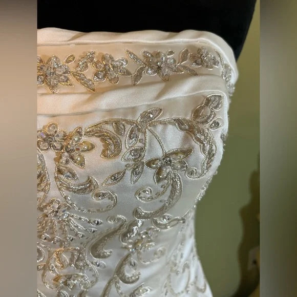 Clearance Sale: Princess Wedding Gown with a Sleeveless Bodice, Rhinestones and Pickup Skirt.