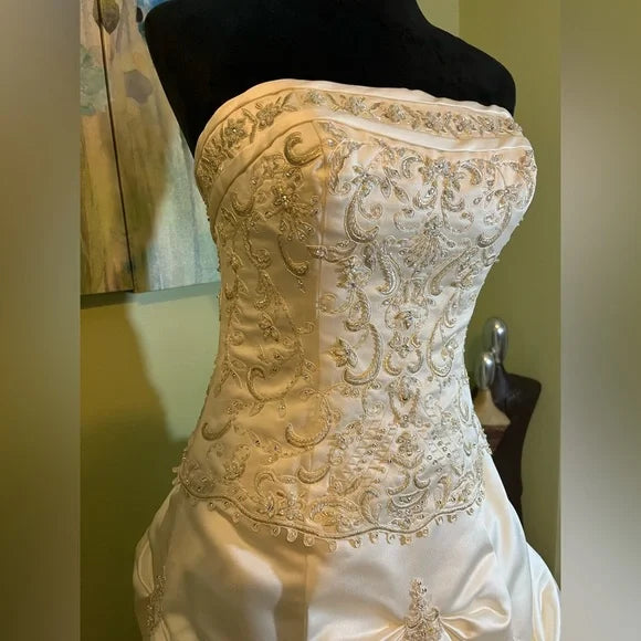 Clearance Sale: Princess Wedding Gown with a Sleeveless Bodice, Rhinestones and Pickup Skirt.