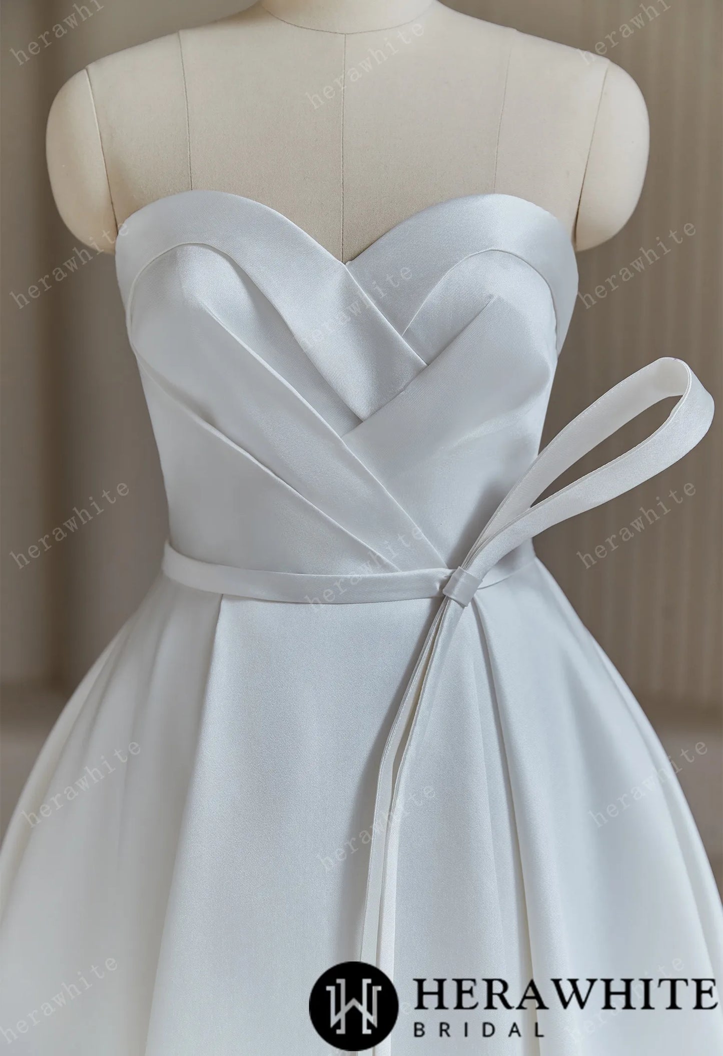 Ball Gown Wedding Dress With Pleated Bodice And Detachable Bow