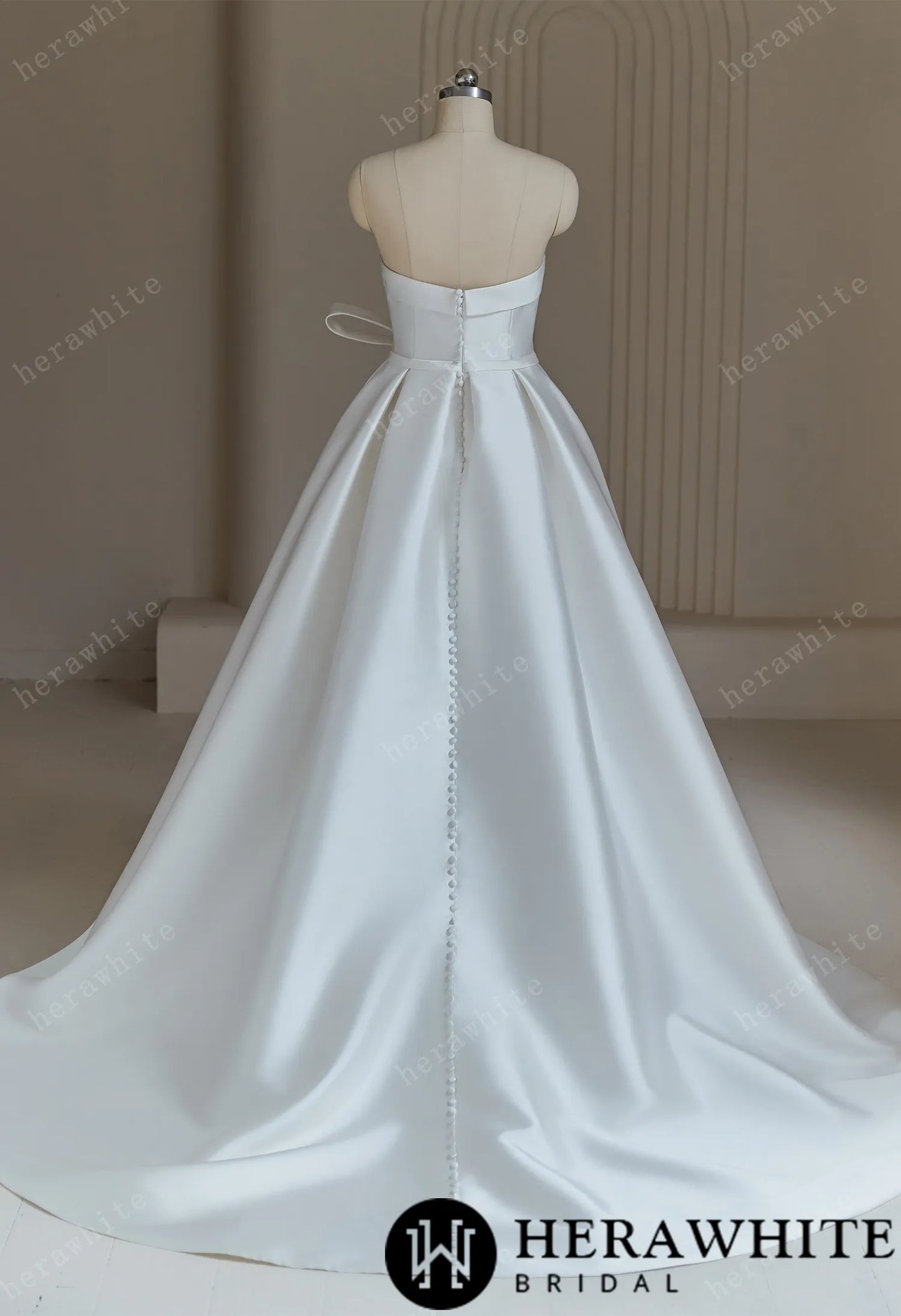 Ball Gown Wedding Dress With Pleated Bodice And Detachable Bow