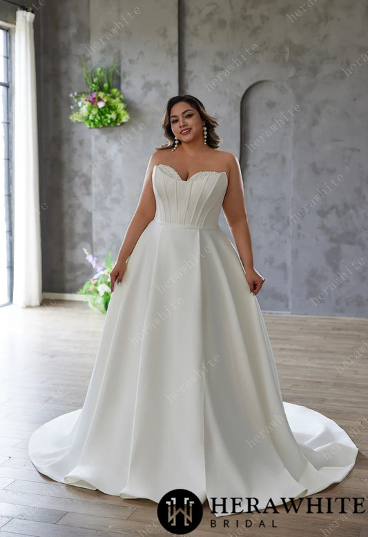 Bride wearing Mattie- Satin Sculpted Strapless A-Line Bridal Gown- Unforgettable Bridal