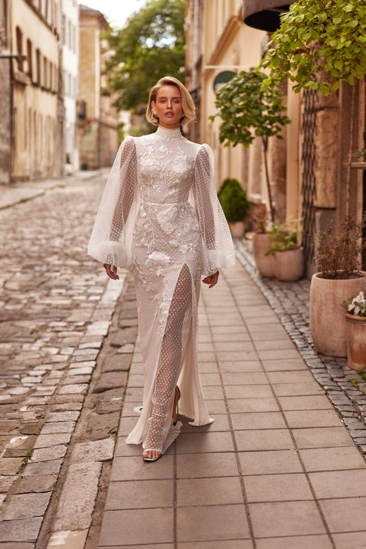 Bride wearing The Pearl Wedding Dress by designer Nataliya Vilchuk 