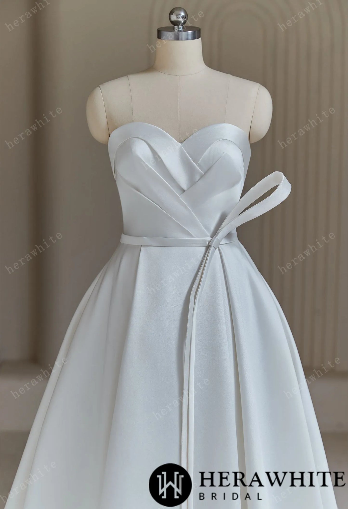 Ball Gown Wedding Dress With Pleated Bodice And Detachable Bow