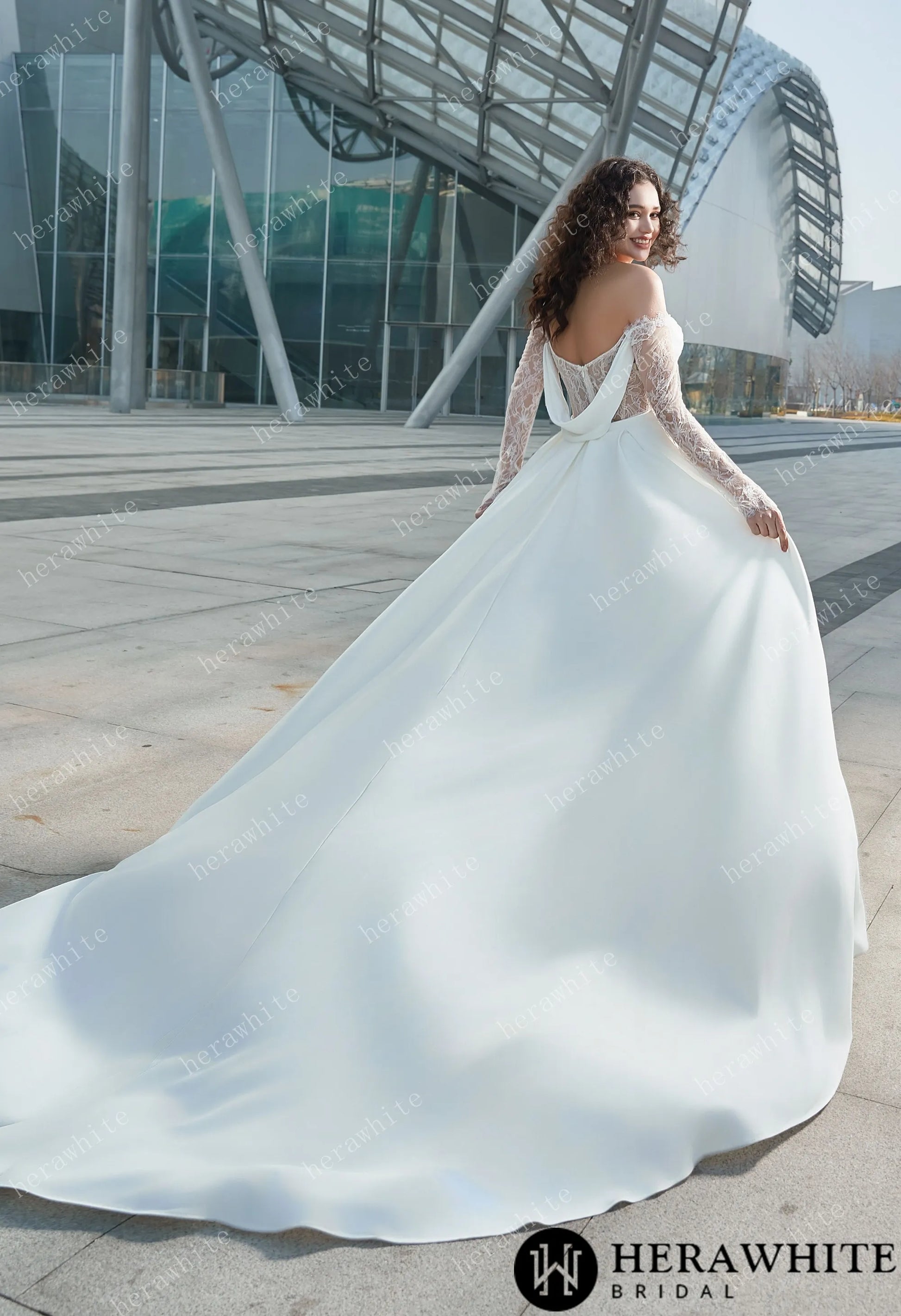 Full - length view of the gown, displaying the detachable train offer you different options