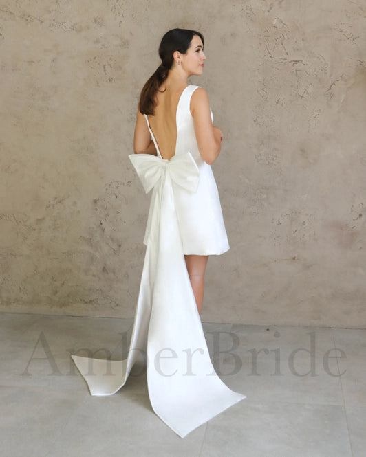 Knee Length Backless Satin Wedding Dress With Dramatic Bow